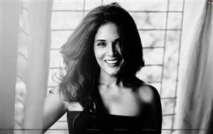 Richa Chadda with a charming smile in a black and white photoshoot